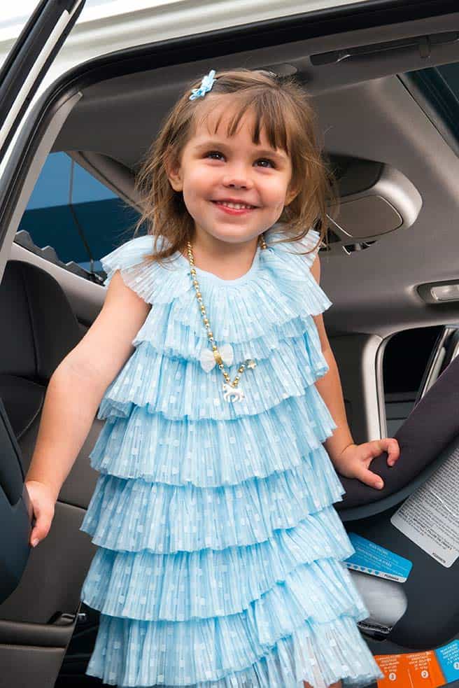 Little girl in a car